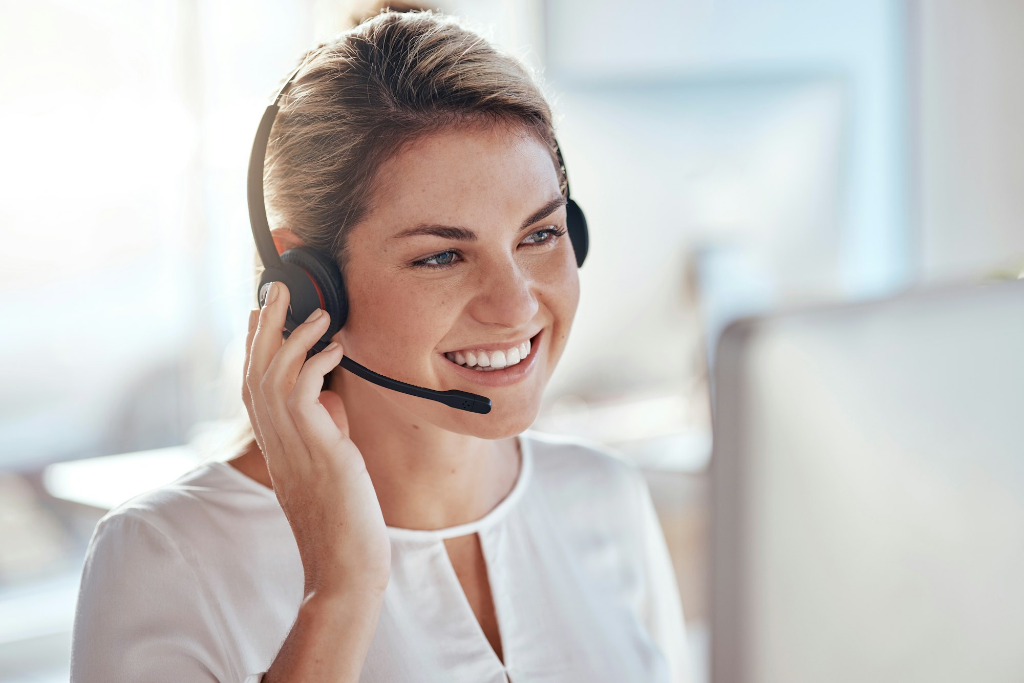 Call center, computer and smile with woman in office for customer service, technical support and ad